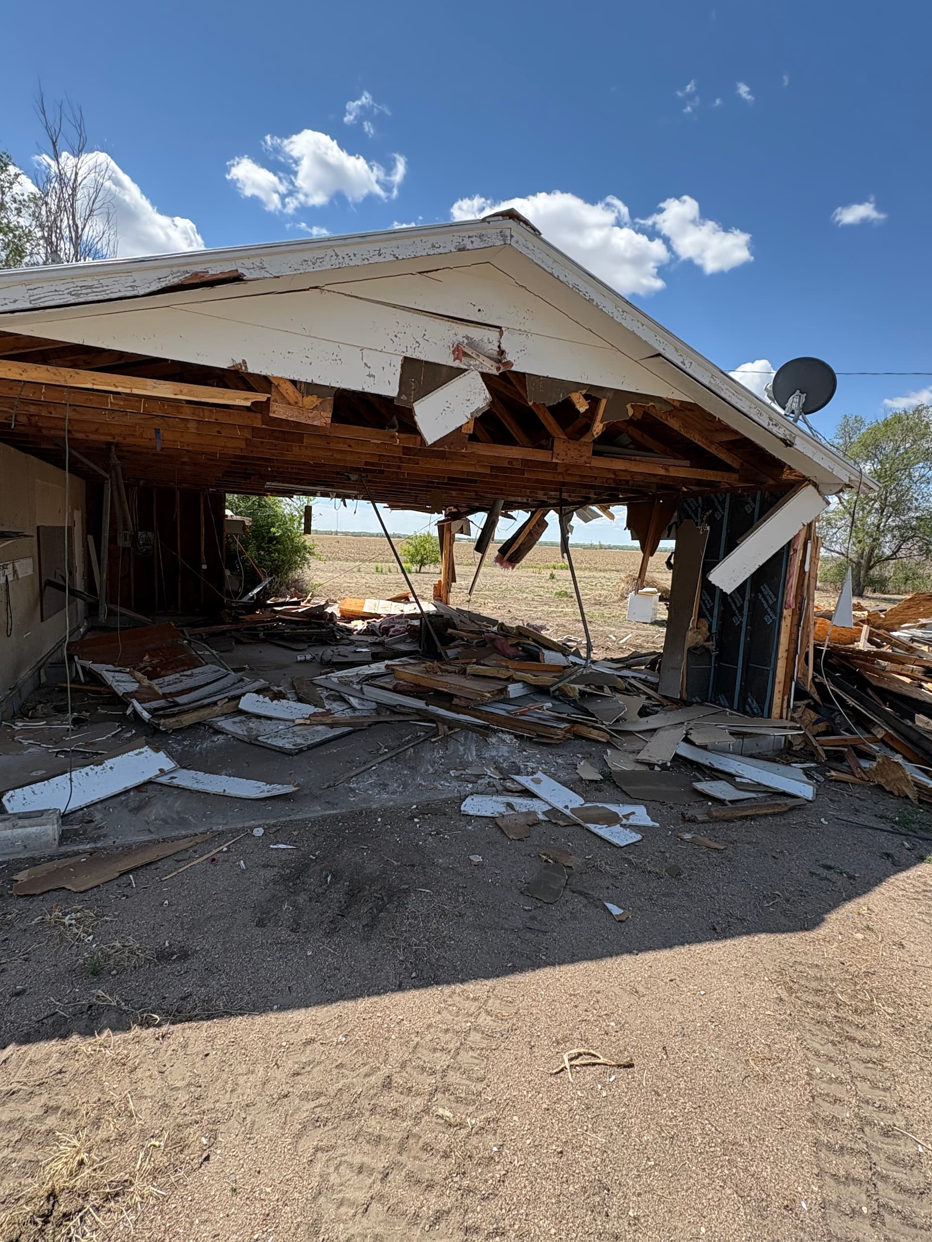 When a Garage Needs to Go We Make It Disappear image