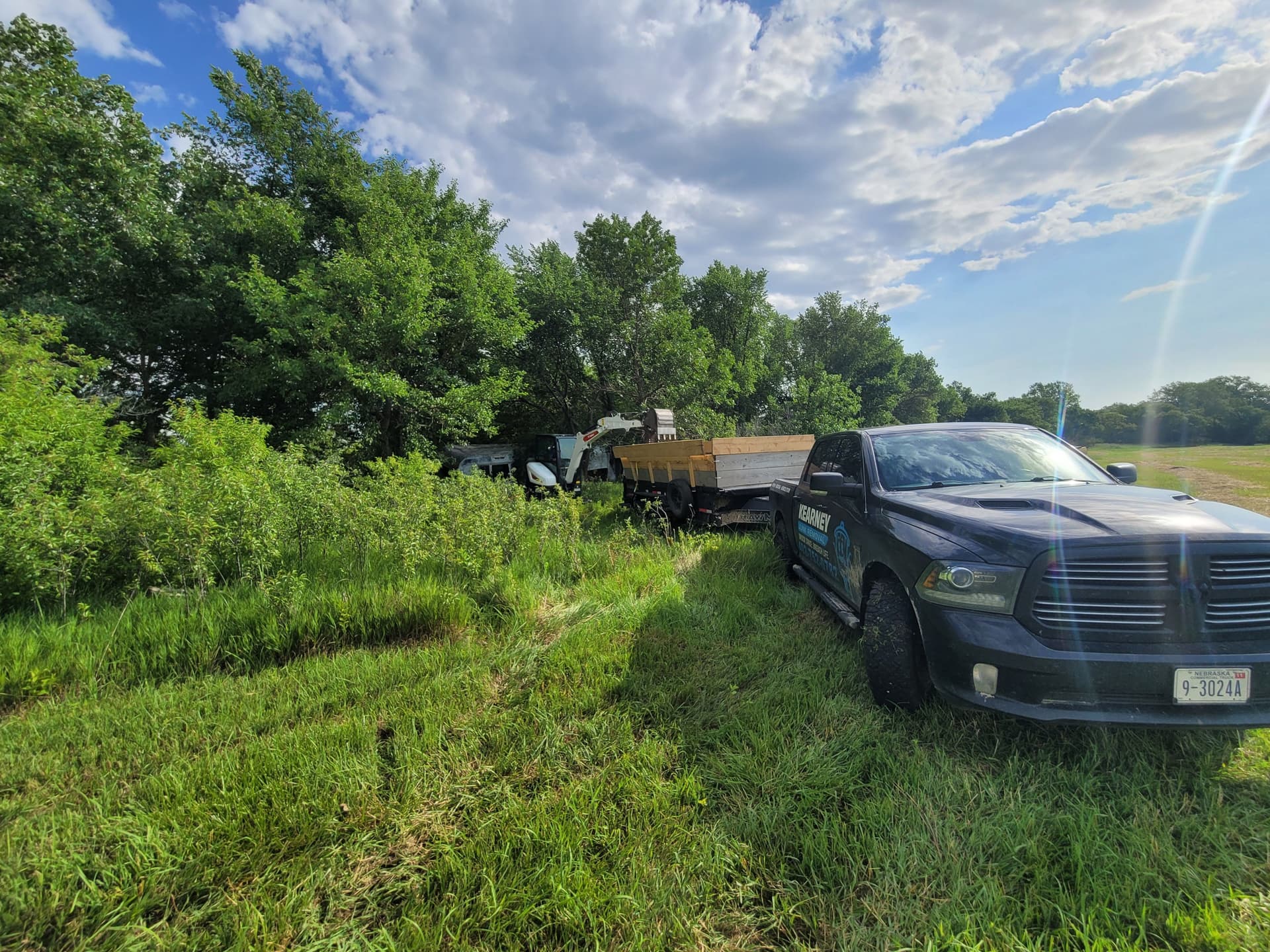Gallery photos for Abandoned Camper and Junk Hauled Out From Along the River: Image #1