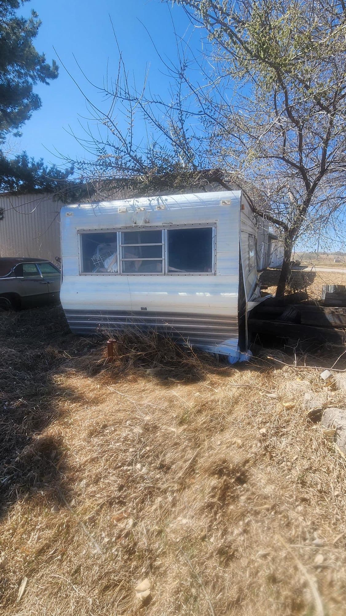 Gallery photos for Worn-Out Camper Removed at Johnson Lake Property: Image #1