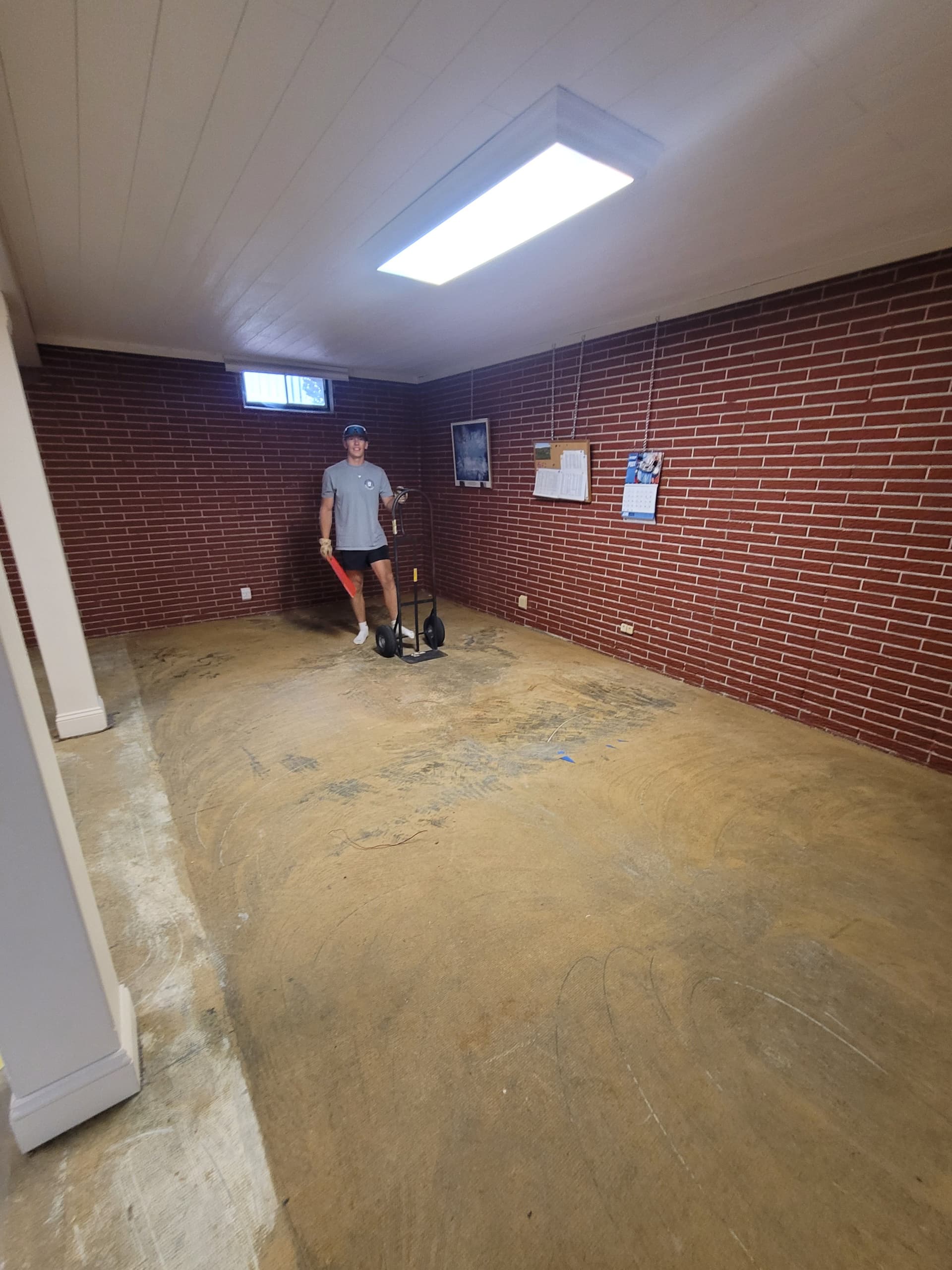 Gallery photos for Furniture Cleared Out So New Flooring Could Go Right In: Image #1